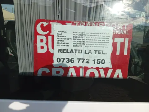 CDI Transport timetable Craiova–București in a minibus window at Craiova North Bus Station, departures every two hours, 13 August 2026