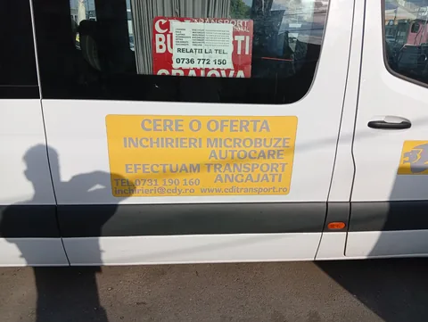 CDI Transport minibus at Craiova North Bus Station with a sign for minibus and coach hire, 13 August 2026
