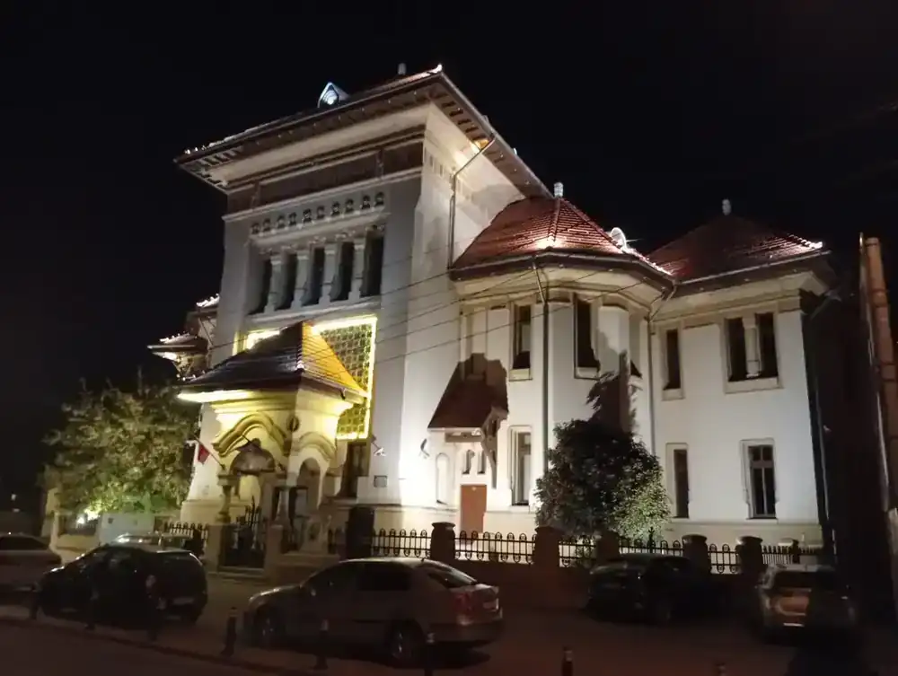 Muzeul Olteniei, lit for the night — the name carved into the tower