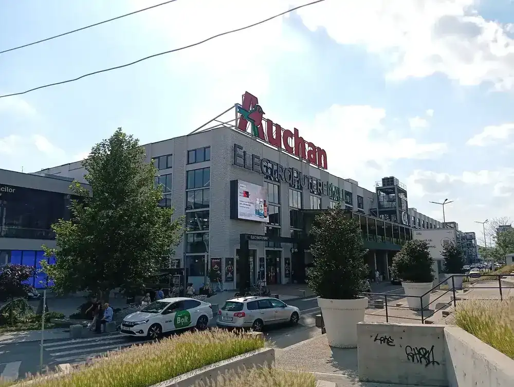 From the street — Auchan over the main entrance