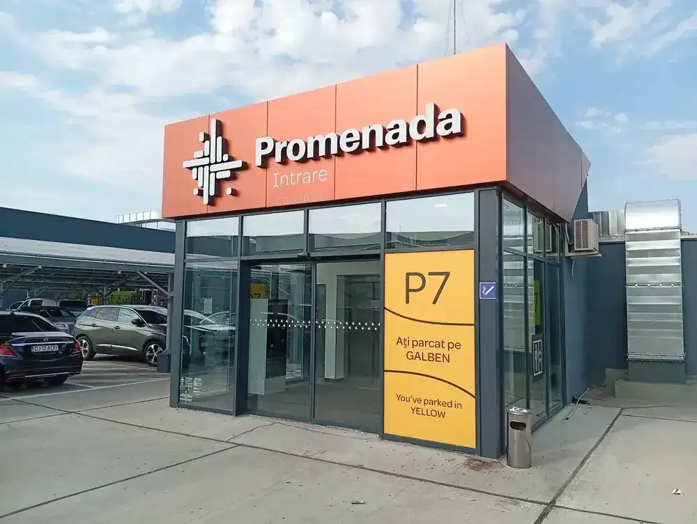 The P7 door off the covered car park, with the parking-colour sign beside it