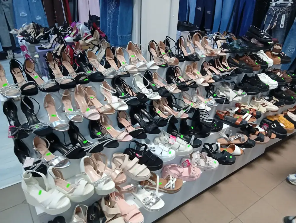 Women’s sandals and heels, price tags stuck to the toe