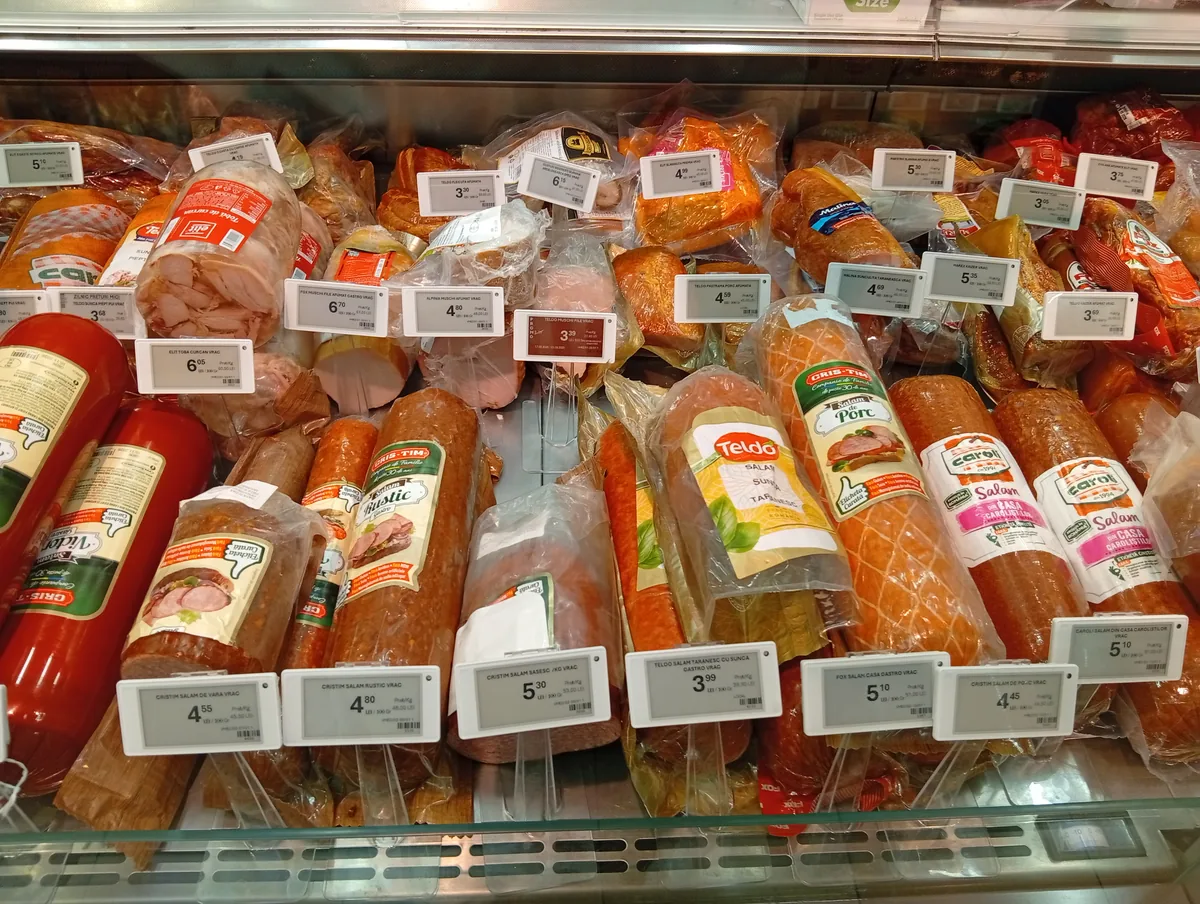 Romanian salami, smoked ham and bacon at the Profi Super deli counter, Strada Henry Ford, Craiova area, Cris-Tim, Teldo, Caroli and Fox, priced per 100 g, 22 September 2026
