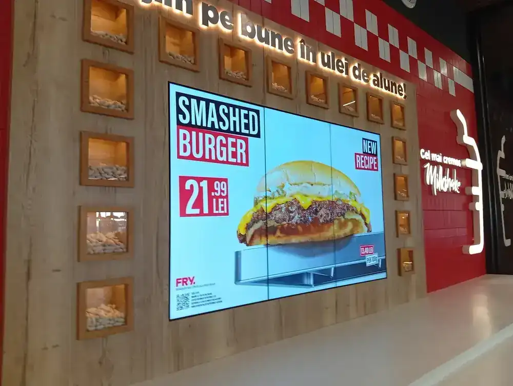 FRY in the food court — peanut boxes, the peanut-oil sign and the offer screen