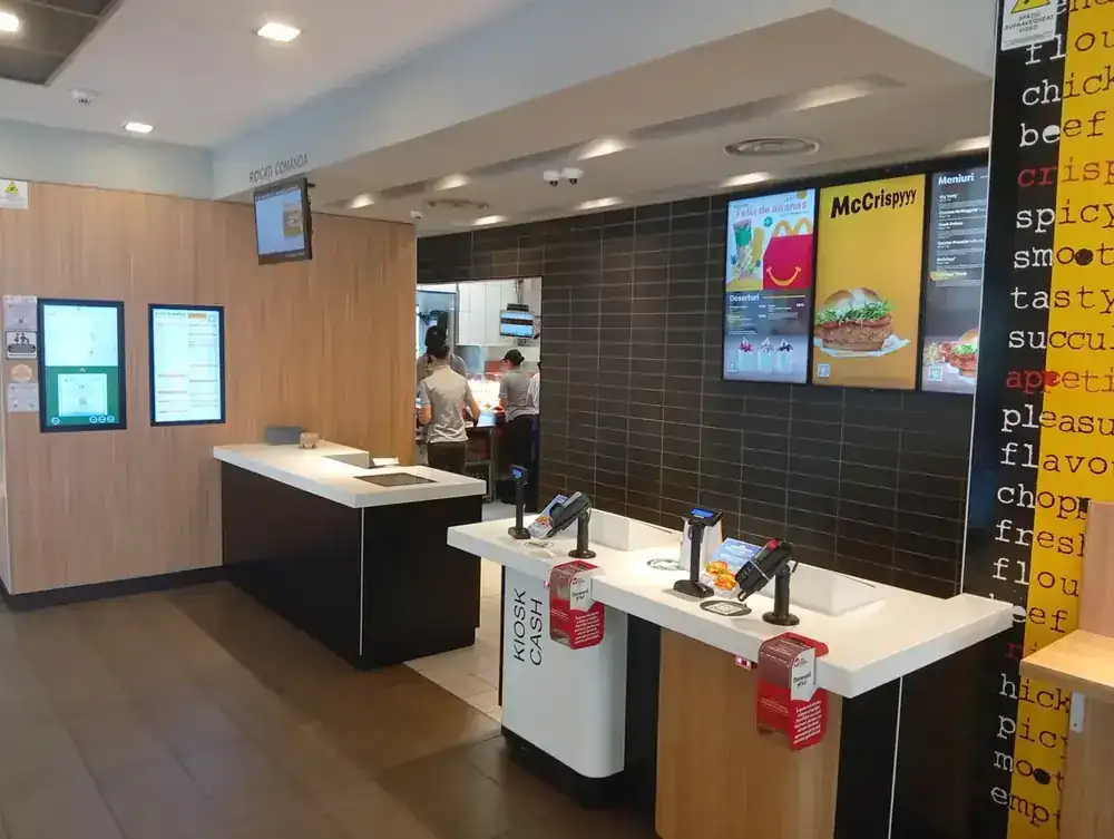Counter and collection point; the price board is on the left wall