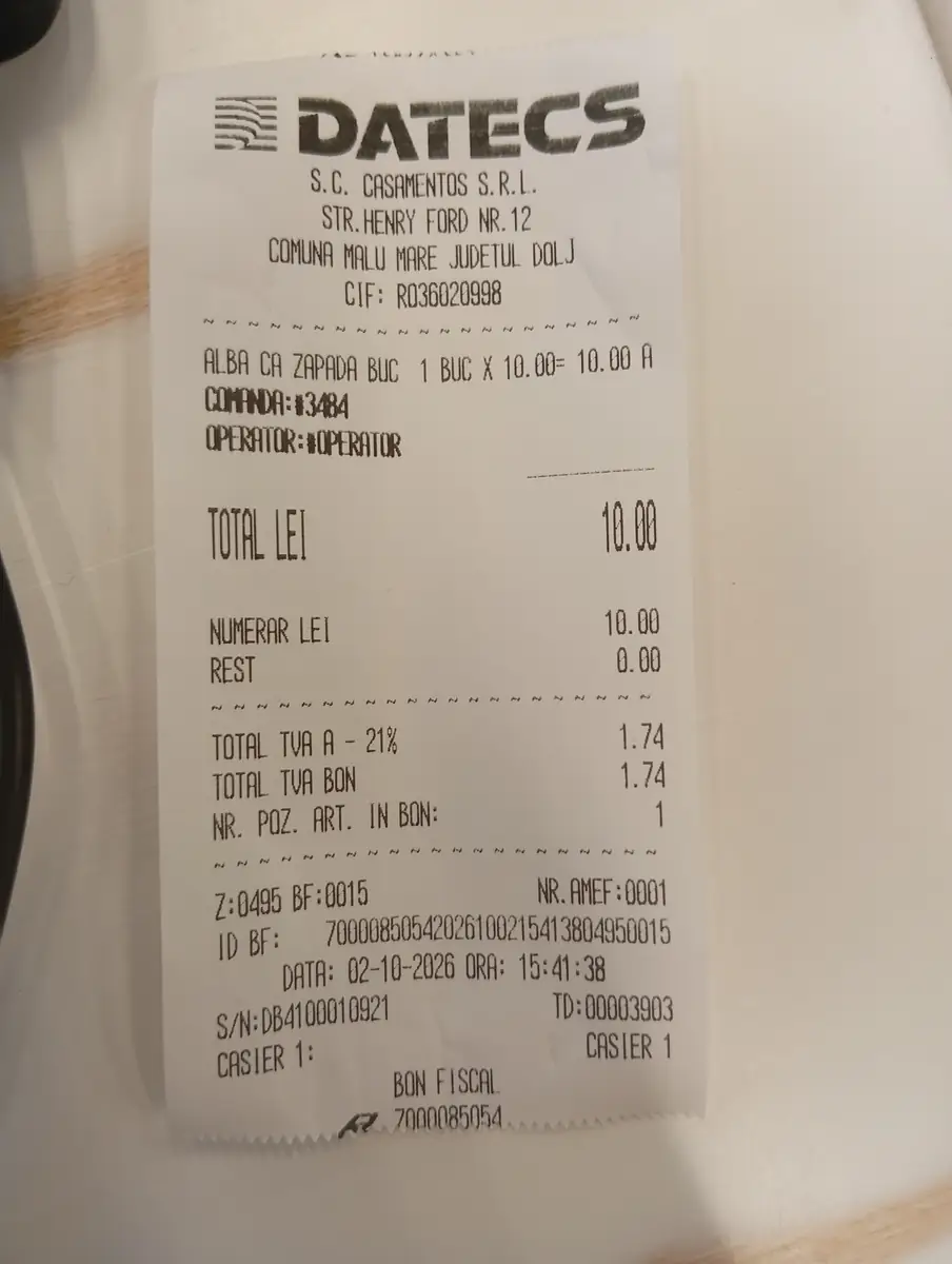 Its receipt: one slice, 10.00 lei, paid cash, 2 October 2026