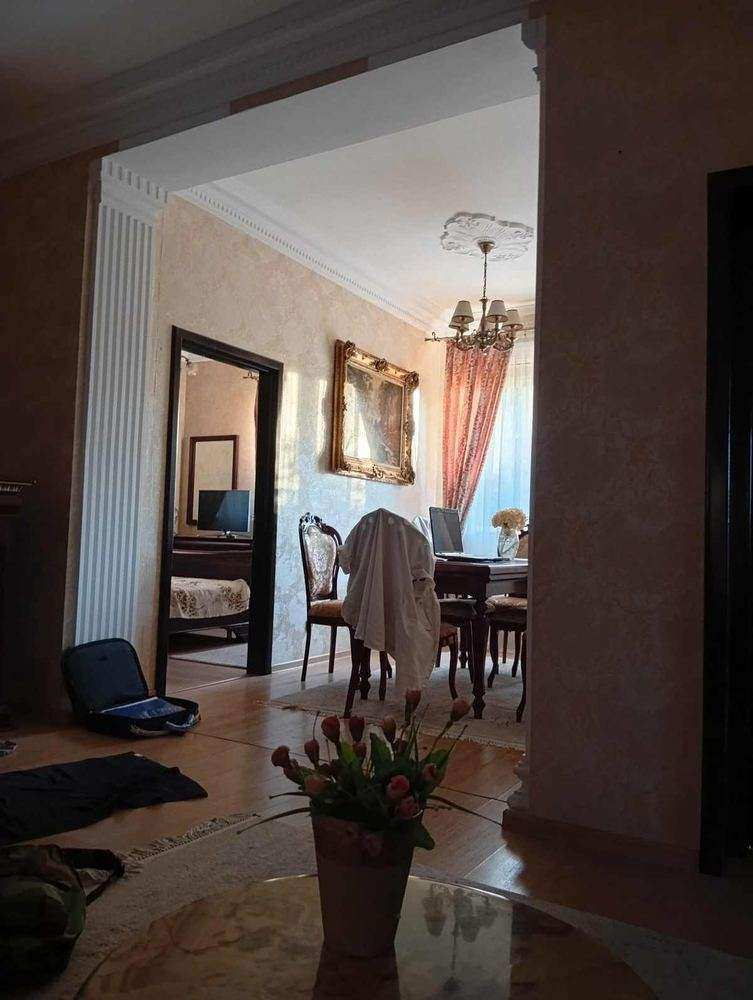 The rooms run into each other — the flat is wide, not narrow